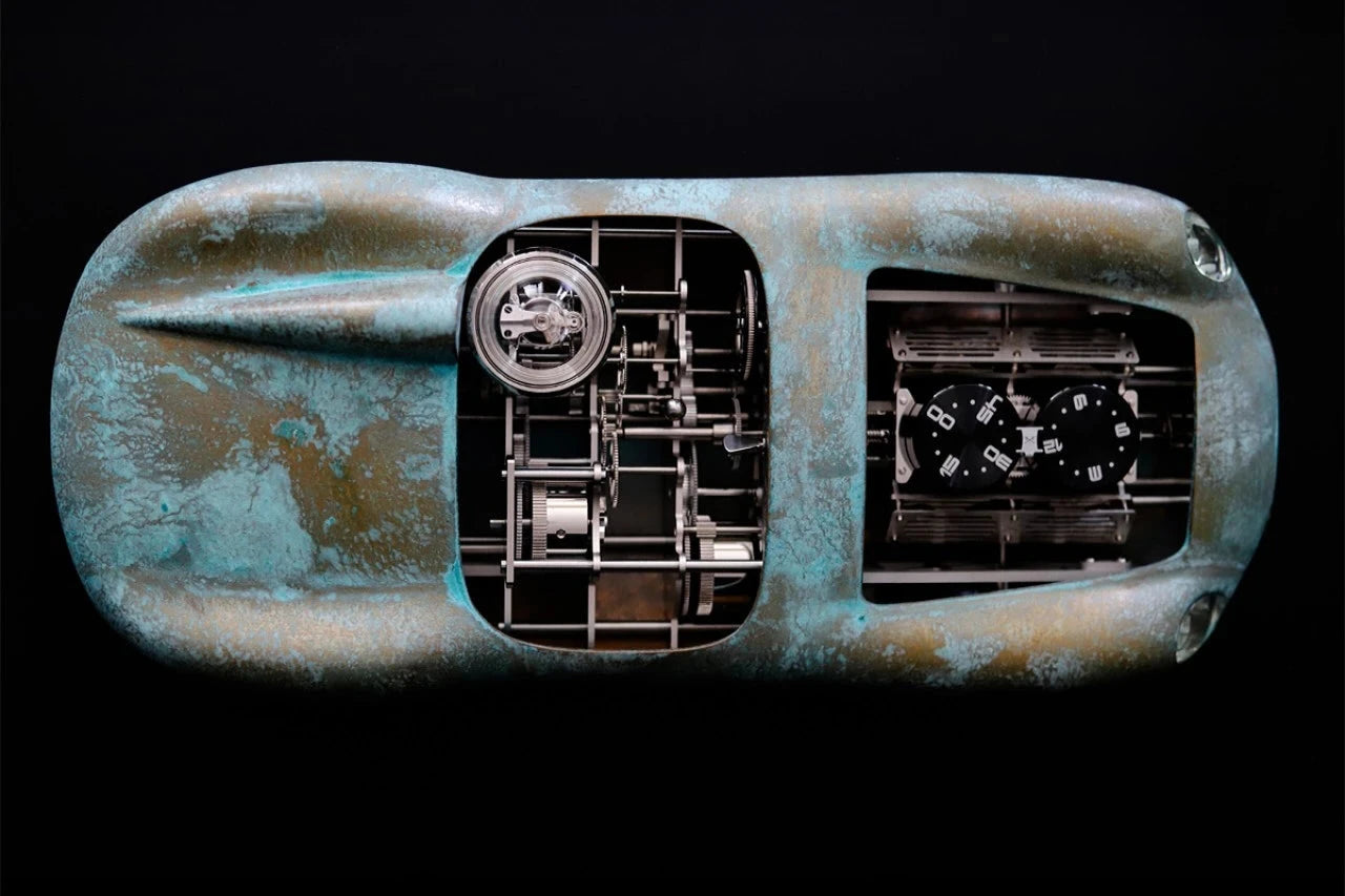 Metallic object with intricate internal mechanisms on a black background
